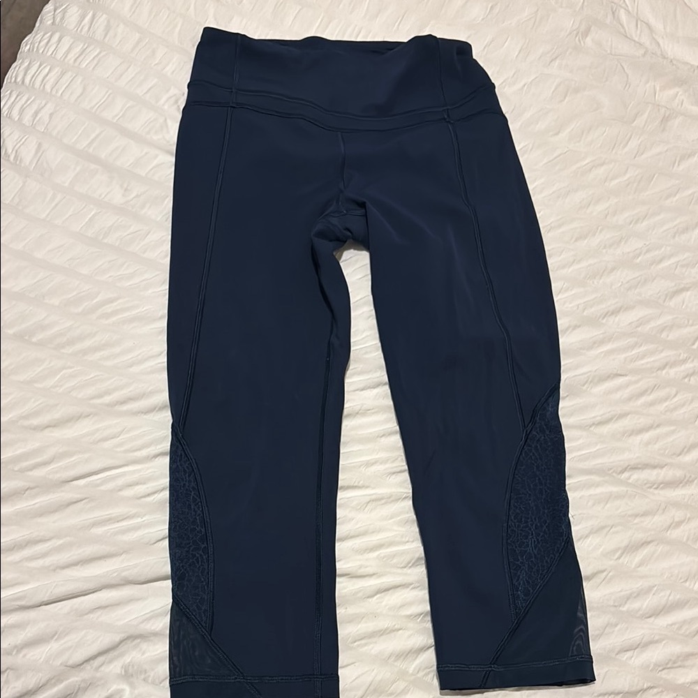 Navy cropped lululemon leggings with floral mesh